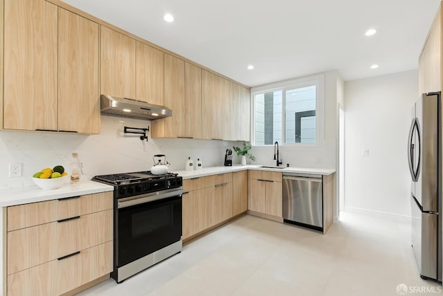 1204-1206 Funston Ave, San Francisco, CA 94122 - kitchen featuring light brown cabinets, appliances with stainless steel finishes, under cabinet range hood, modern cabinets, and recessed lighting