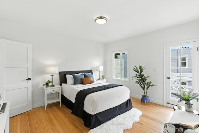 1204-1206 Funston Ave, San Francisco, CA 94122 - bedroom featuring multiple windows and light wood finished floors