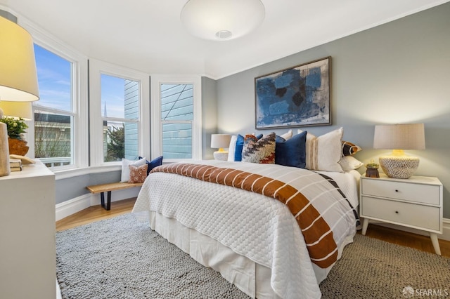 bedroom featuring wood-type flooring