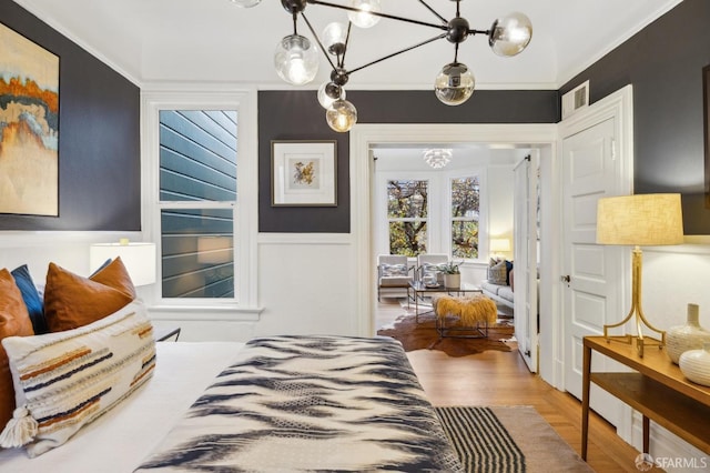 bedroom with a chandelier