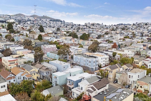 birds eye view of property with a mountain view