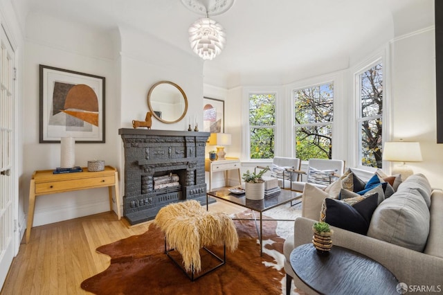 interior space with a chandelier and light wood-type flooring