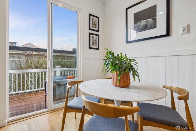 dining space featuring parquet flooring