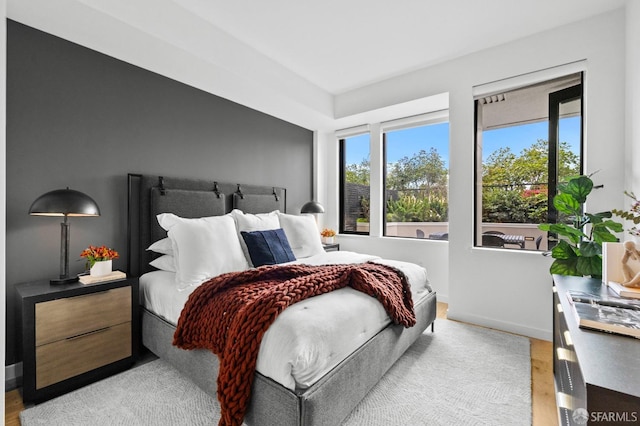 bedroom with light wood-type flooring