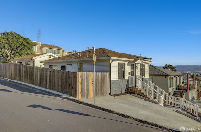 view of front of house with fence