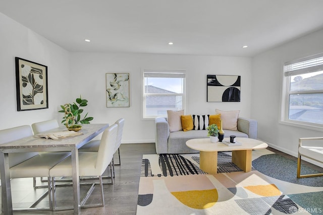 living room with baseboards, recessed lighting, and wood finished floors