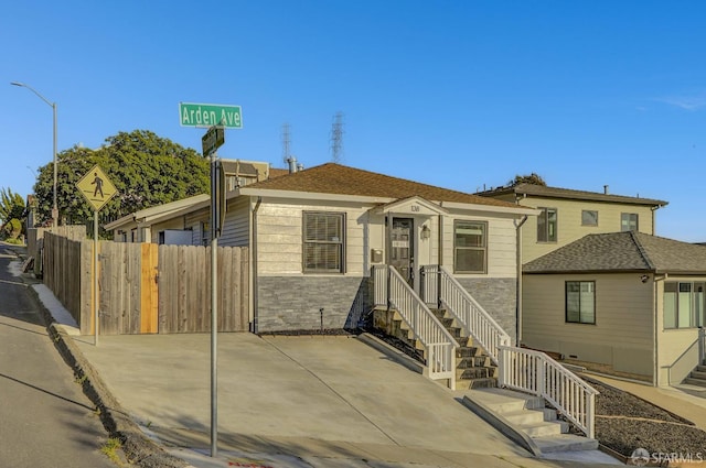 view of front of property with fence