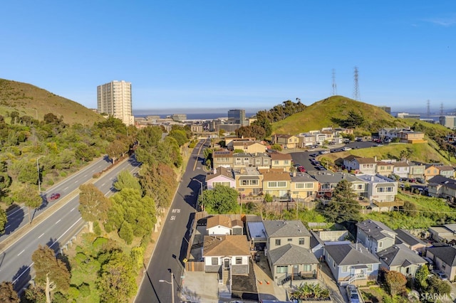 birds eye view of property with a residential view