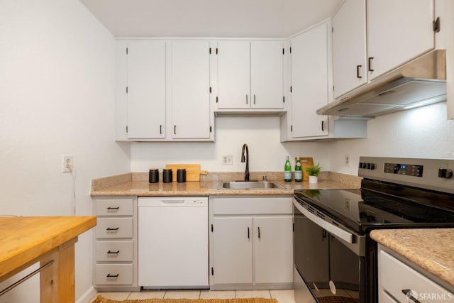 kitchen featuring dishwasher, sink, white cabinets, light tile patterned floors, and electric stove