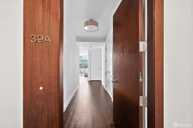 301 Mission St Unit 39A, San Francisco, CA 94105 - corridor featuring dark wood-type flooring and baseboards