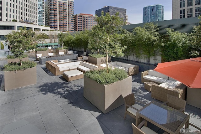 301 Mission St Unit 39A, San Francisco, CA 94105 - view of property's community with outdoor lounge area, a view of city, and a patio