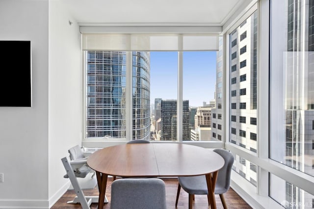 301 Mission St Unit 39A, San Francisco, CA 94105 - dining room with a city view, dark wood-style floors, and expansive windows
