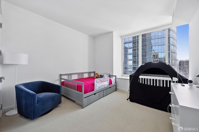 301 Mission St Unit 39A, San Francisco, CA 94105 - carpeted bedroom featuring baseboards and a view of city