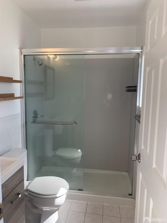 3-5 Sonoma St, San Francisco, CA 94133 - bathroom with tile patterned floors, toilet, a shower stall, and vanity