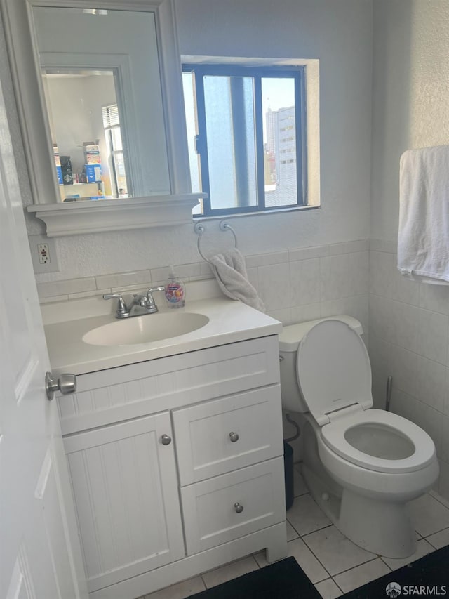 3-5 Sonoma St, San Francisco, CA 94133 - bathroom featuring toilet, tile patterned flooring, vanity, and tile walls