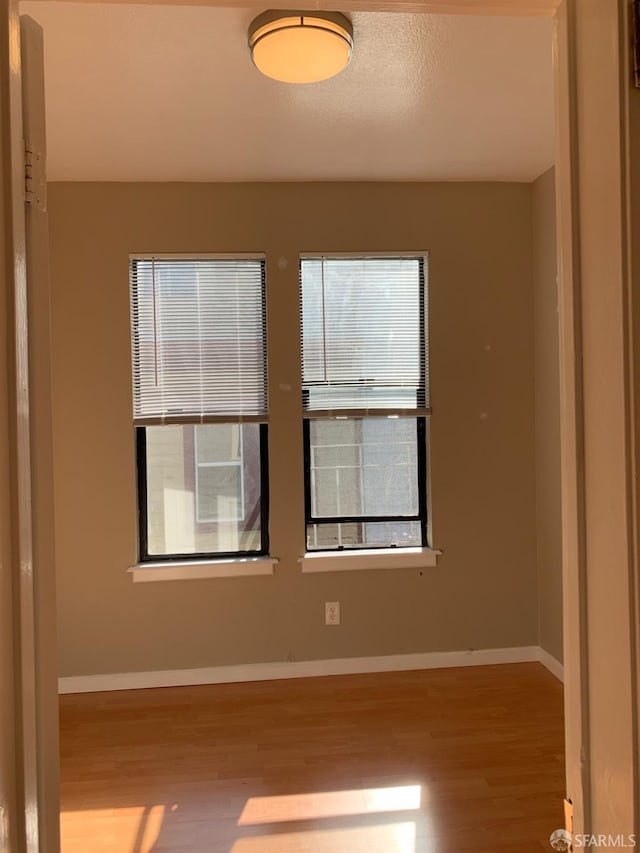 3-5 Sonoma St, San Francisco, CA 94133 - spare room featuring wood finished floors and baseboards