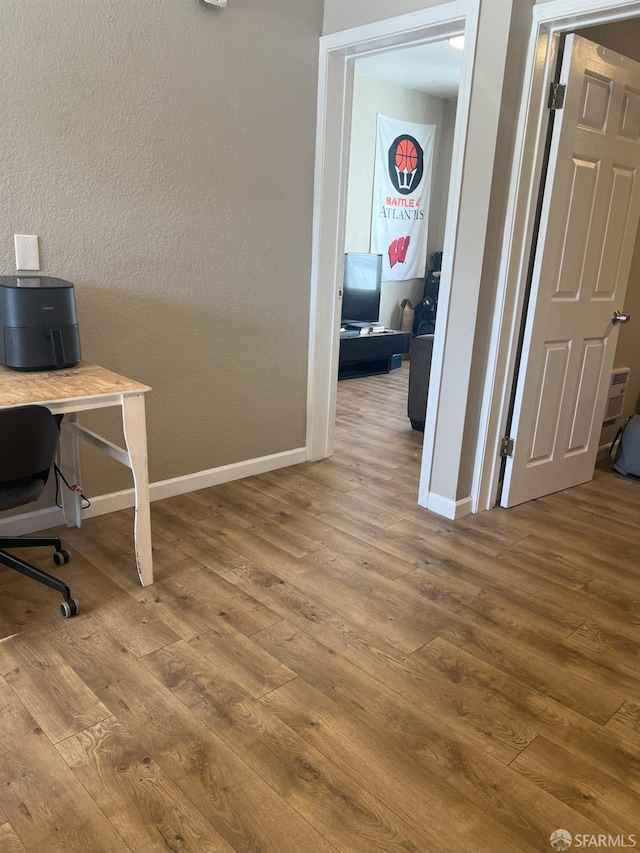 3-5 Sonoma St, San Francisco, CA 94133 - home office with wood finished floors, baseboards, and a textured wall