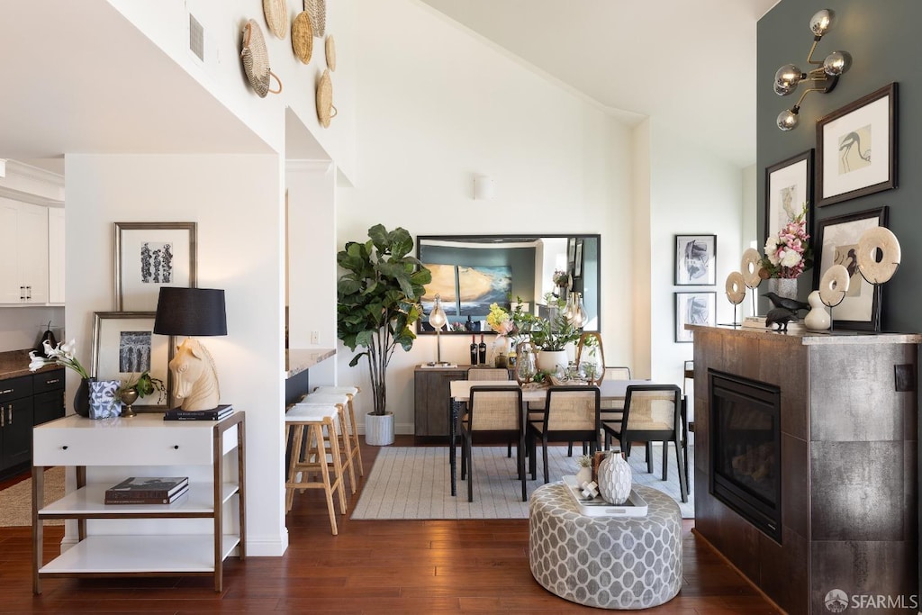 living room with dark hardwood / wood-style flooring