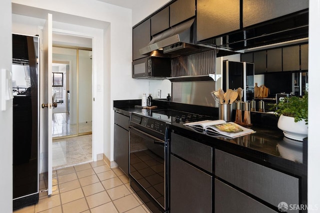 kitchen with dark countertops, light tile patterned flooring, black electric range oven, and under cabinet range hood