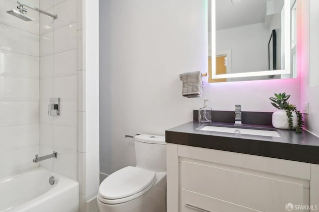 full bath featuring toilet, vanity, and shower / bathtub combination