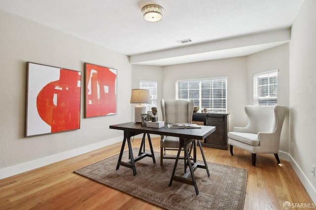 office featuring wood finished floors and baseboards