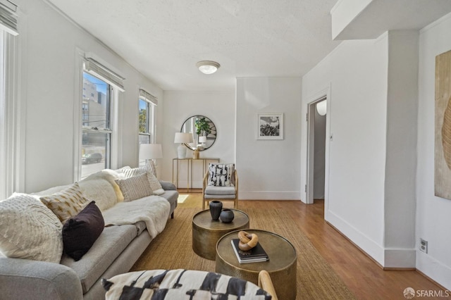 32-34 Gough St, San Francisco, CA 94103 - living area featuring wood finished floors and baseboards