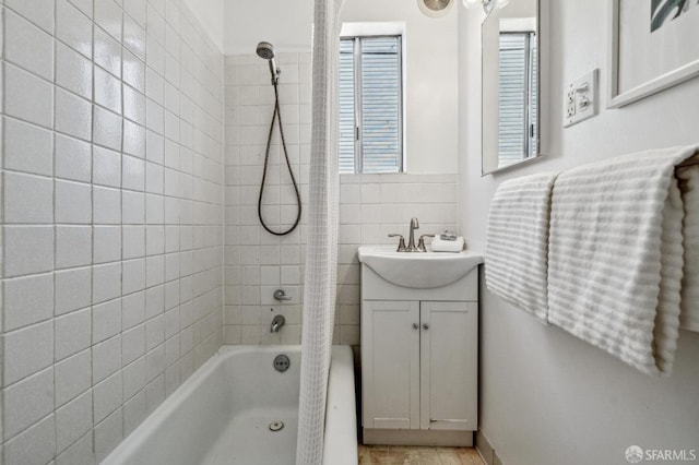 32-34 Gough St, San Francisco, CA 94103 - full bathroom featuring tile walls, vanity, and shower / bath combination with curtain