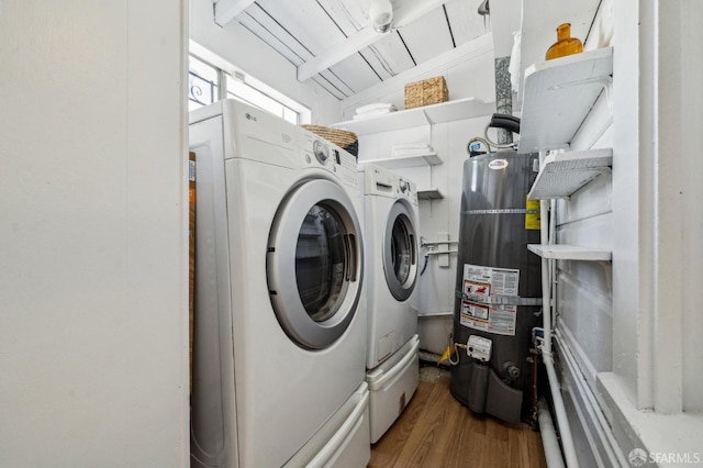 32-34 Gough St, San Francisco, CA 94103 - laundry room featuring water heater, washer and dryer, and wood finished floors