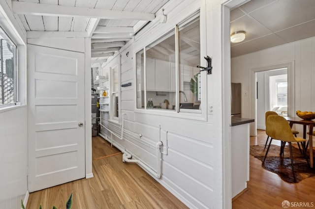 32-34 Gough St, San Francisco, CA 94103 - corridor with wood finished floors, healthy amount of natural light, and beamed ceiling