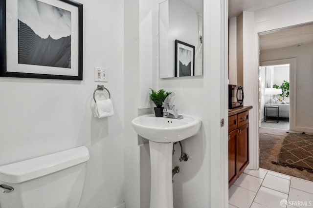 32-34 Gough St, San Francisco, CA 94103 - half bathroom with toilet and tile patterned flooring