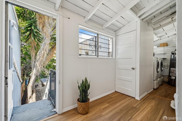 32-34 Gough St, San Francisco, CA 94103 - entryway with washing machine and clothes dryer, wood finished floors, baseboards, and wooden ceiling