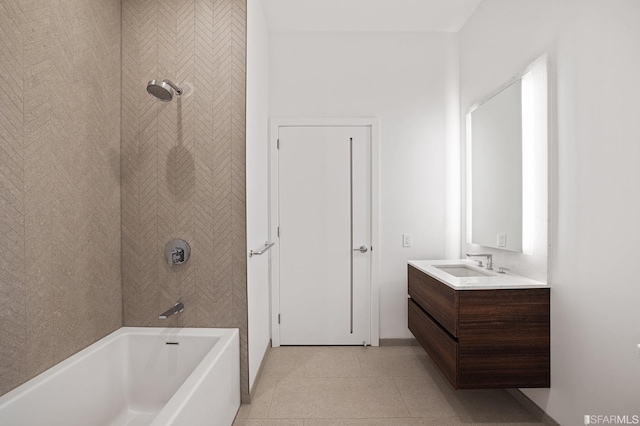 bathroom featuring vanity, bathtub / shower combination, and tile patterned flooring