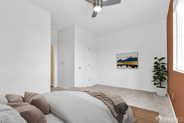 carpeted bedroom featuring ceiling fan