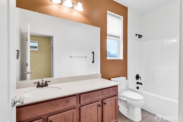 full bathroom with vanity, tile patterned floors, bathing tub / shower combination, and toilet