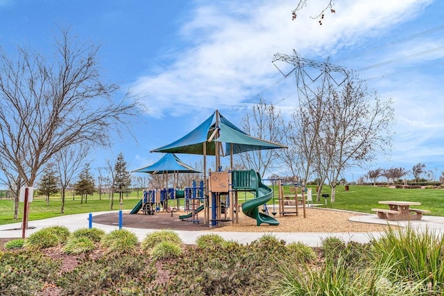 view of playground with a yard