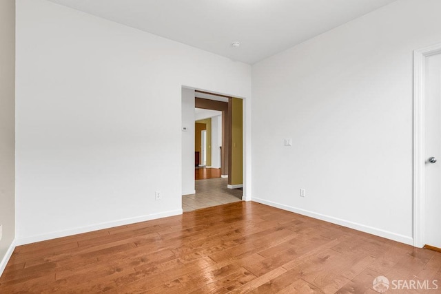 empty room featuring hardwood / wood-style floors