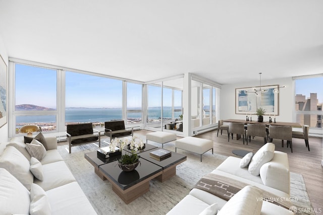 1070 Green St Unit 1001, San Francisco, CA 94133 - living area with a water view, light wood finished floors, and expansive windows
