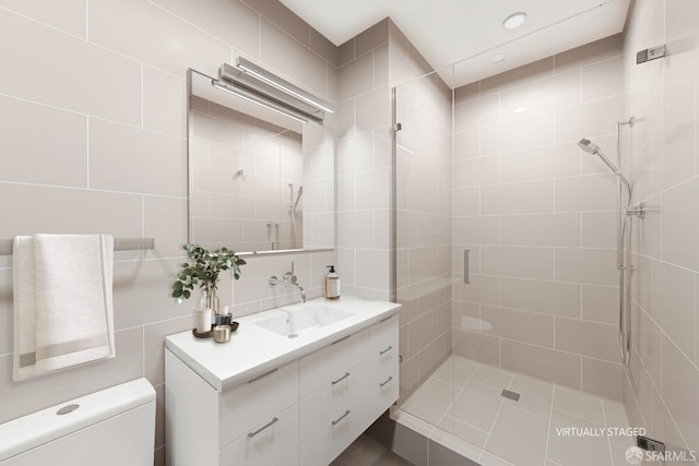 1070 Green St Unit 1001, San Francisco, CA 94133 - bathroom featuring a stall shower, tile walls, vanity, and toilet