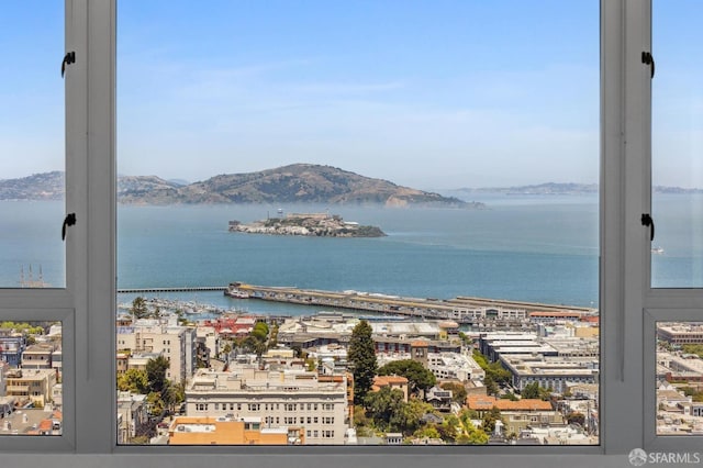 view of water feature with a city view and a mountain view