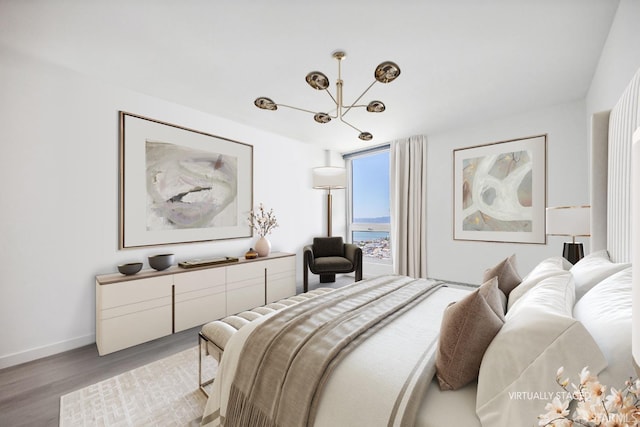 1070 Green St Unit 1001, San Francisco, CA 94133 - bedroom featuring a chandelier, light wood-type flooring, and baseboards