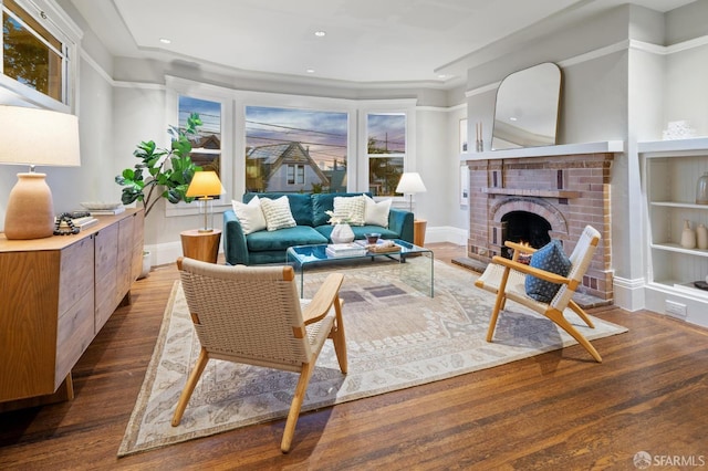 24 Mirabel Ave, San Francisco, CA 94110 - living area with wood finished floors, a brick fireplace, recessed lighting, baseboards, and built in shelves