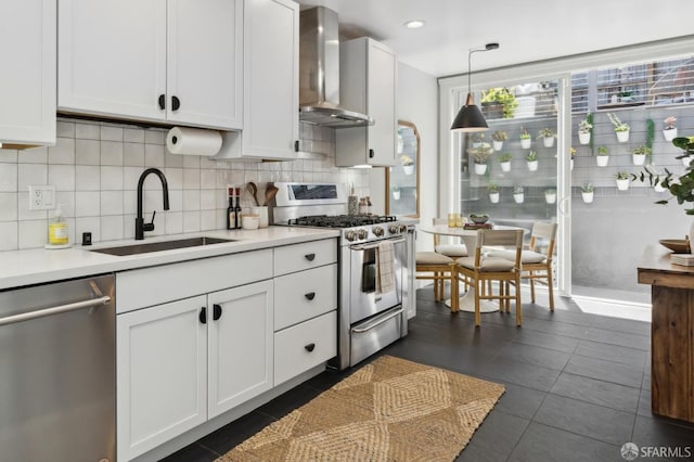 24 Mirabel Ave, San Francisco, CA 94110 - kitchen with wall chimney range hood, appliances with stainless steel finishes, a sink, backsplash, and light countertops