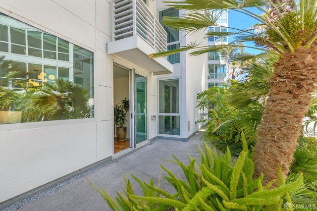 property entrance with a patio