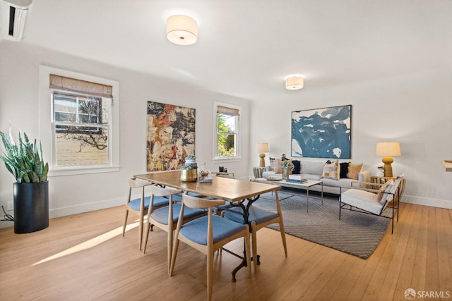 dining space featuring light hardwood / wood-style flooring