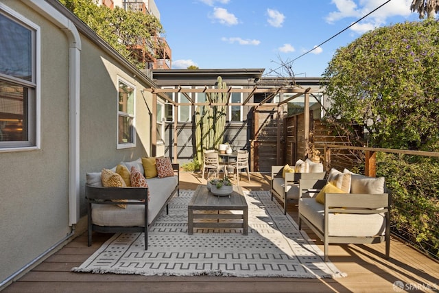 view of patio with an outdoor hangout area and a wooden deck