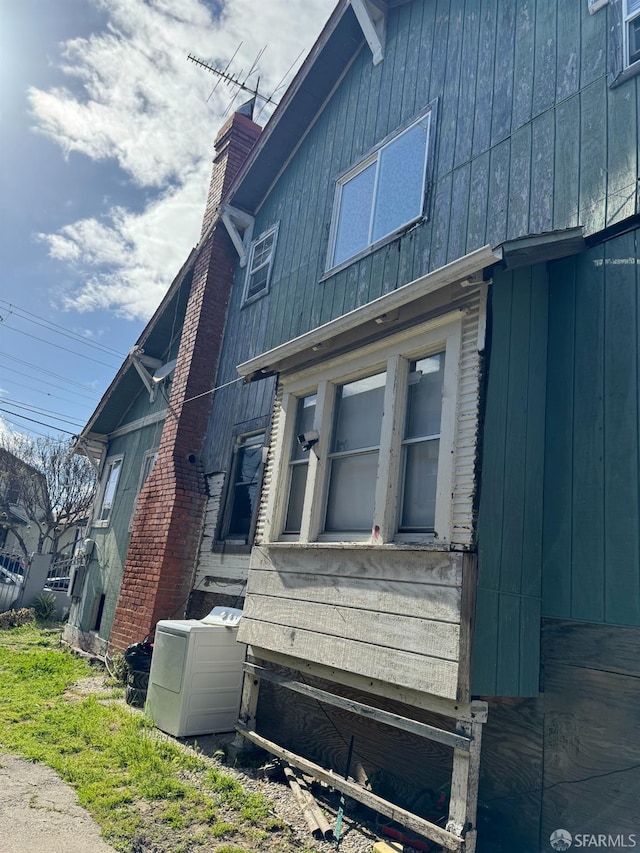 228 15th St, Richmond, CA 94801 - view of side of property featuring a chimney