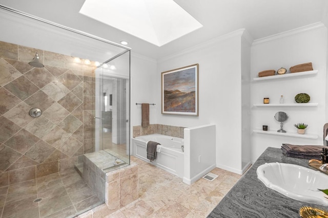 bathroom featuring shower with separate bathtub, a skylight, crown molding, and vanity