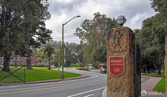 2932 Baker St, San Francisco, CA 94123 - view of asphalt road featuring street lighting, traffic signs, and curbs