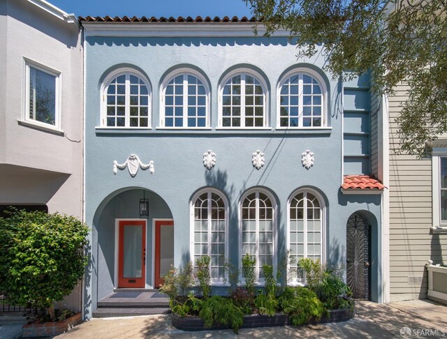 2932 Baker St, San Francisco, CA 94123 - view of front of property with stucco siding and a tiled roof