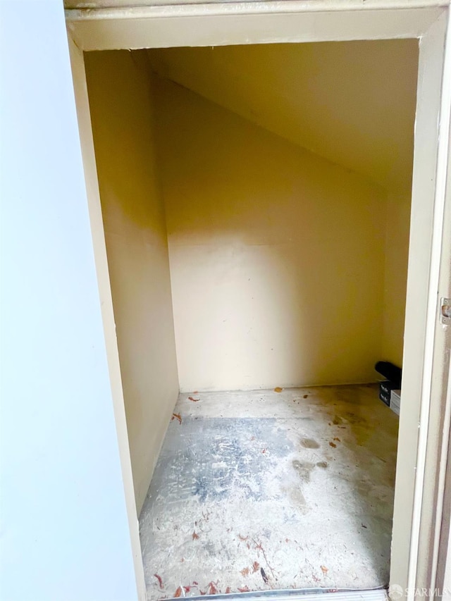 spare room with concrete floors